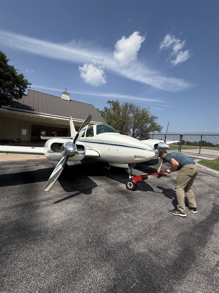 A Beechcraft Baron being pulled up a grade into its hangar with a Robotow 2.0, Marble Falls, Texas.